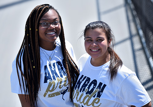 Two female students wearing ϲʹ Pride t-shirts